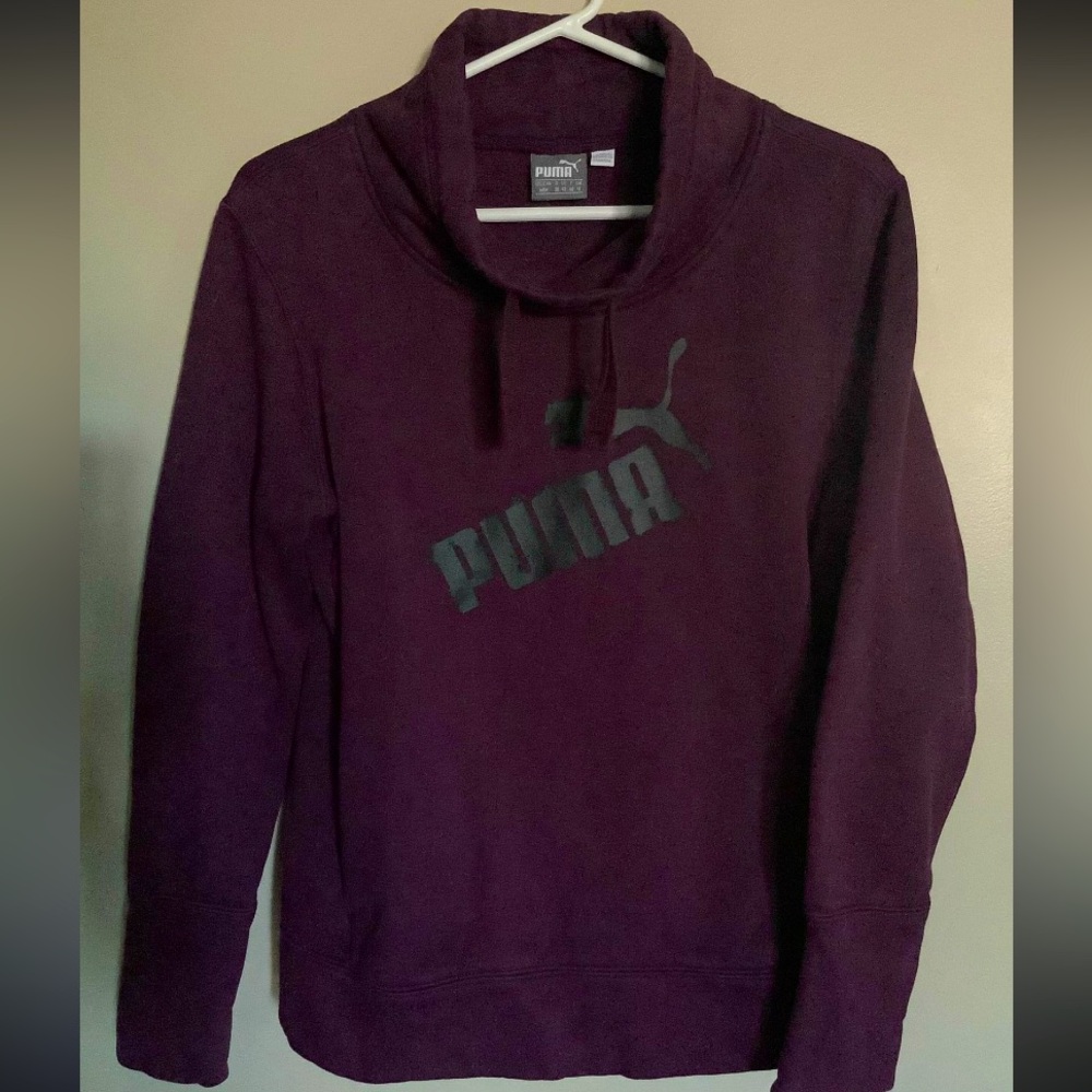 Like new purple Puma hoodie size Med. 70% cotton and 30 % polyester.